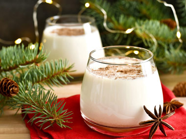 Egg nog is a creamy concoction traditionally made with milk, cream, sugar, whipped eggs, and spices.