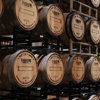 The barrel acts as a catalyst, imparting flavors, colors, and aromas to the bourbon.