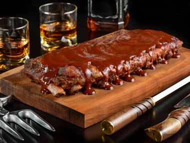 A bourbon-based barbecue sauce can create a seamless flavor link between your drink and your meal