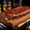 A bourbon-based barbecue sauce can create a seamless flavor link between your drink and your meal