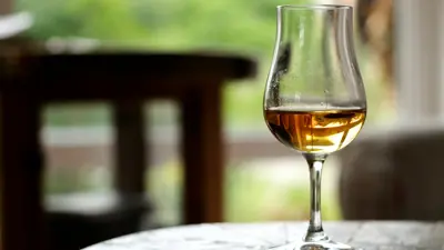 For serious bourbon drinkers, the classic long-stemmed snifter is essential