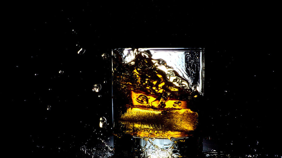 Adding ice to bourbon does more than just chill it; it dilutes the spirit as the ice melts.